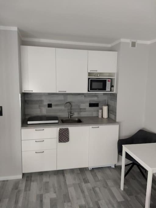Apartment In เบรเมอร์ฮาเฟิน ภายนอก รูปภาพ